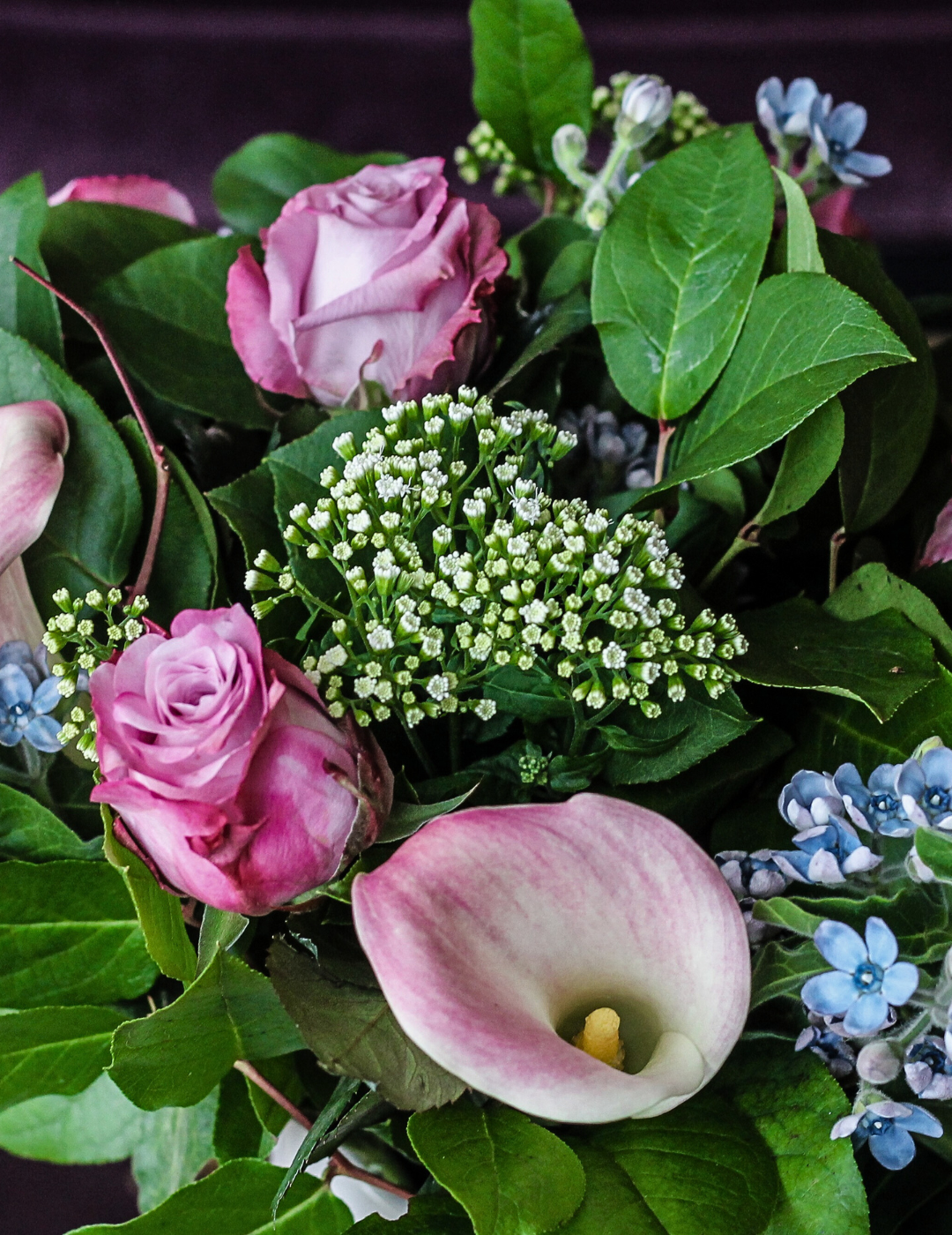 Fresh flowers in a guest room at the ambassade hotel, adding a warm and elegant touch.