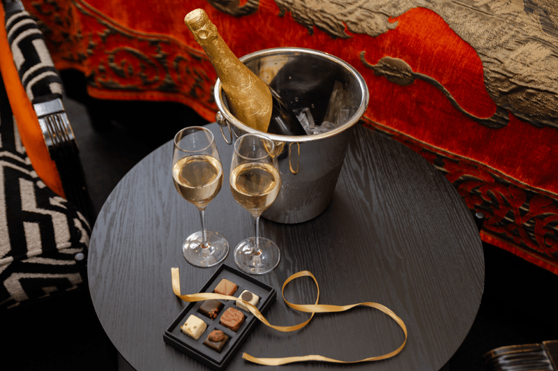 Cava and chocolates welcome gift in the room at the ambassade hotel in amsterdam, available as an optional extra for guests.