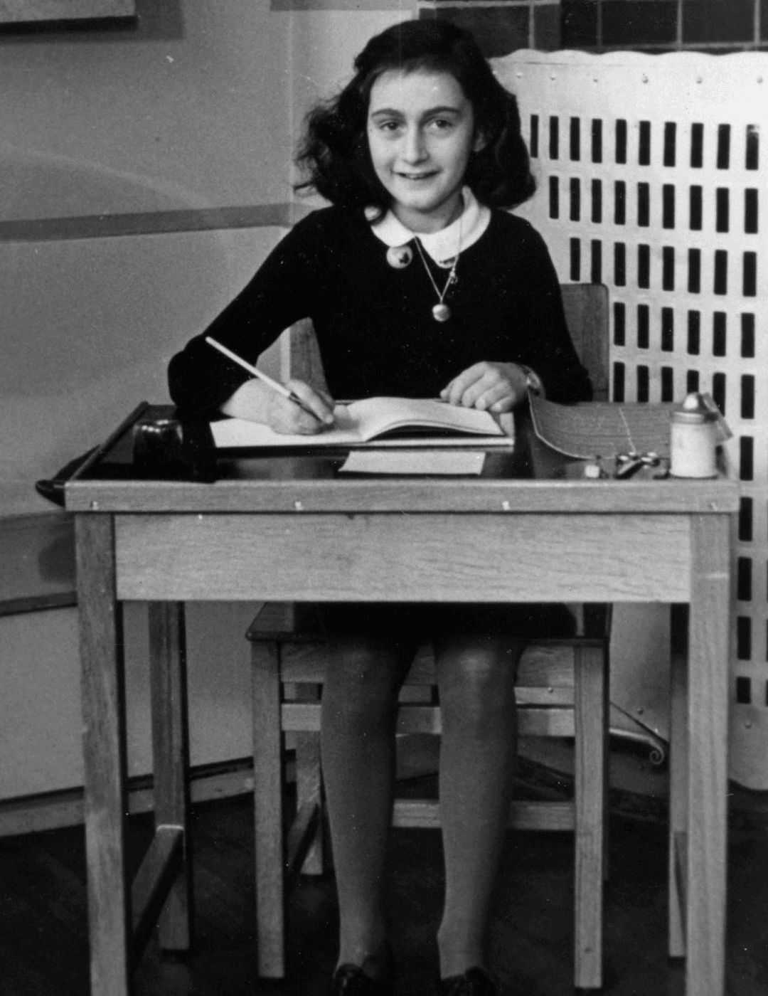 Historic photo of anne frank attending school in amsterdam.