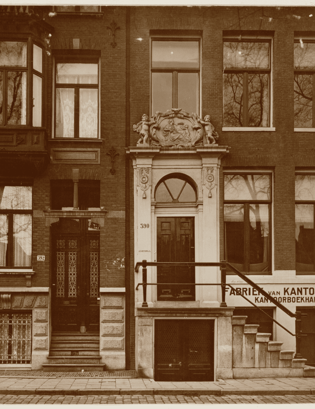 Vintage photo of the building at singel 390 along the canal in amsterdam.