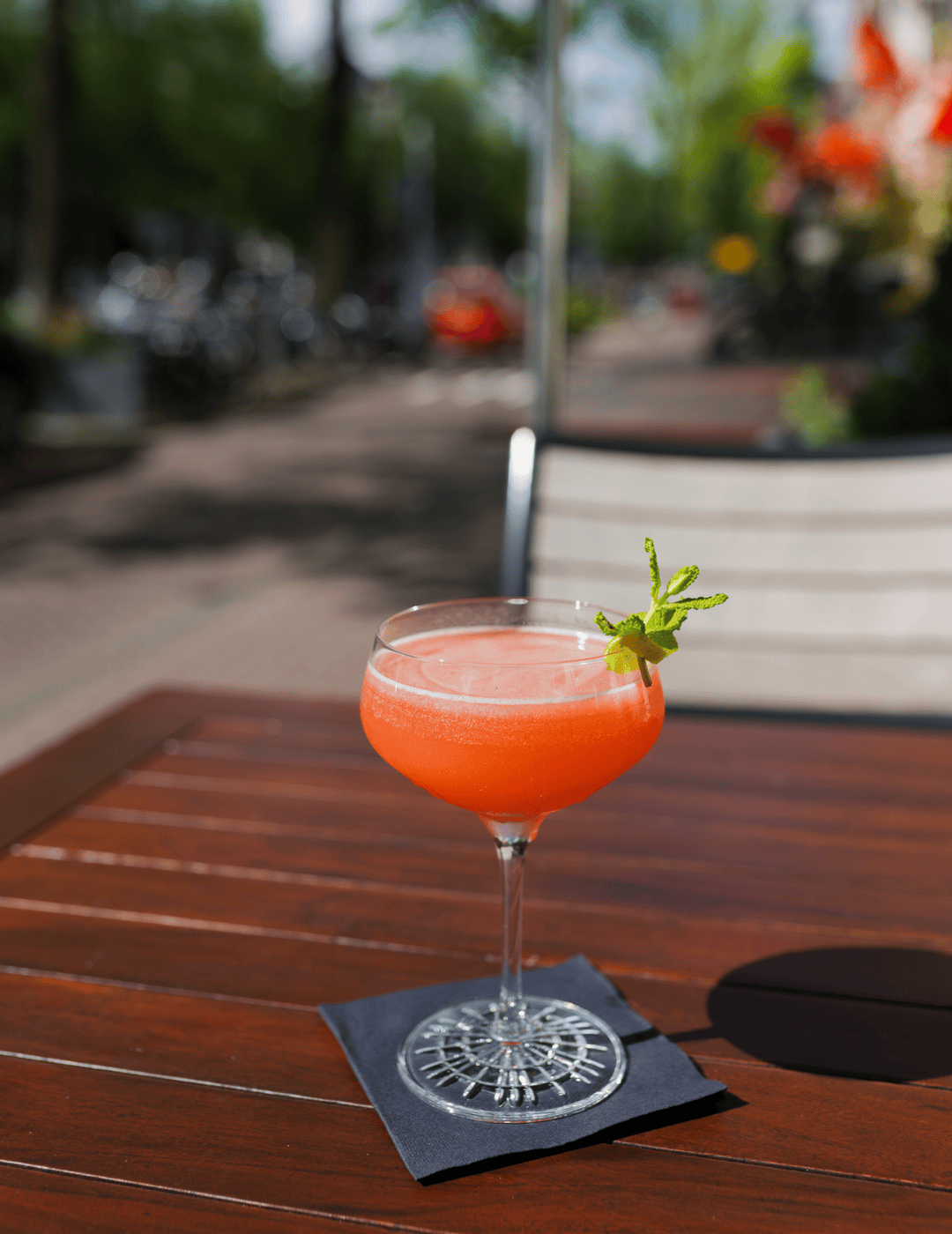 Cocktail enjoying sunlight on the terrace at the ambassade hotel.