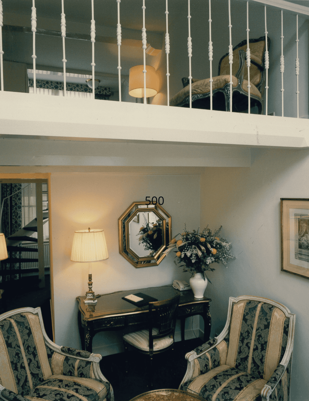 Vintage photo of an old room interior at the ambassade hotel in amsterdam, showcasing classic furnishings and decor.