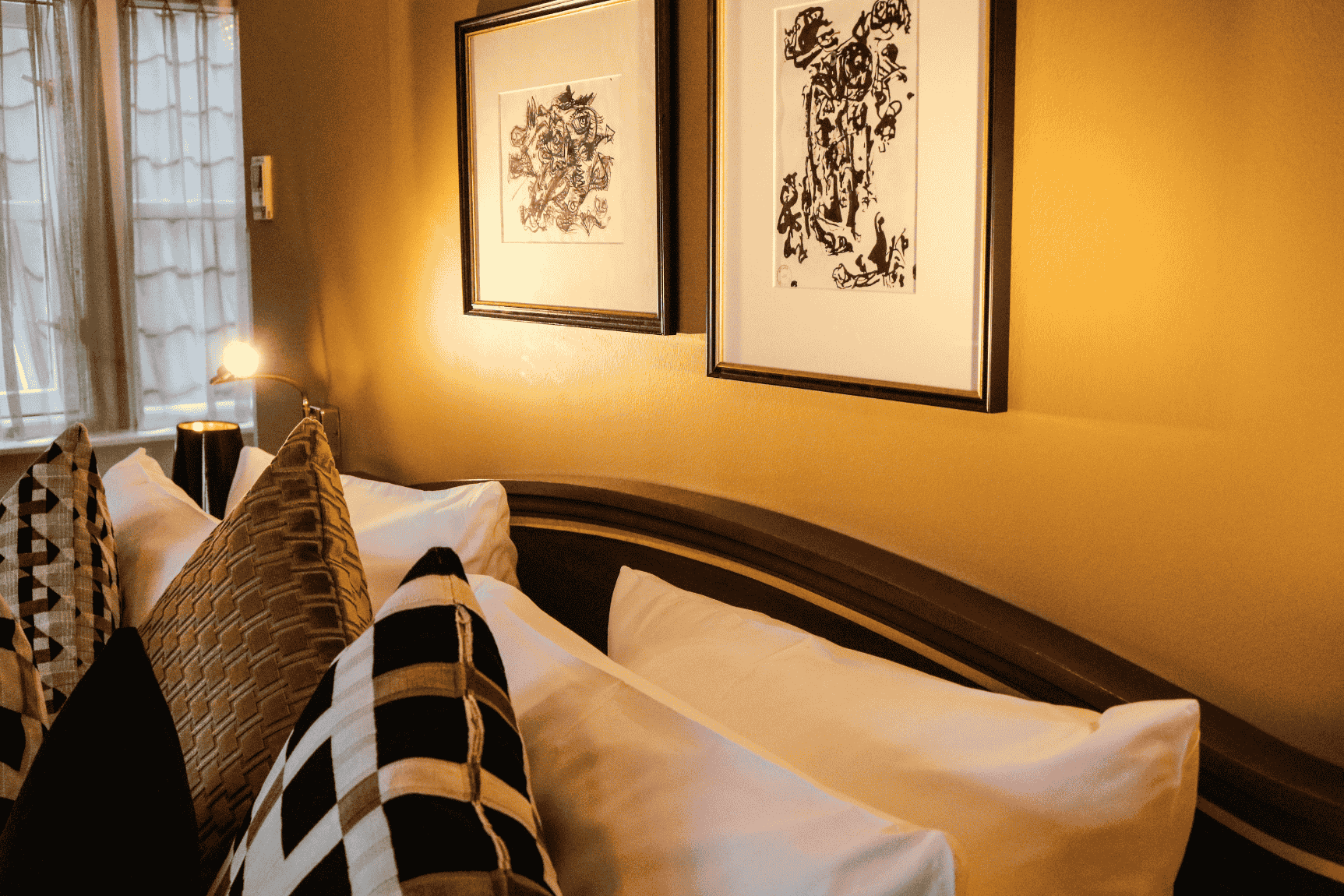 Detail of the luxurious bed in a grand suite at the ambassade hotel in amsterdam.