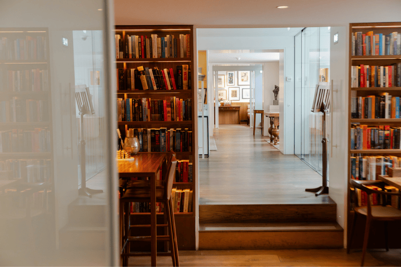 View from the library bar looking towards the lobby and entrance of the ambassade hotel in amsterdam.