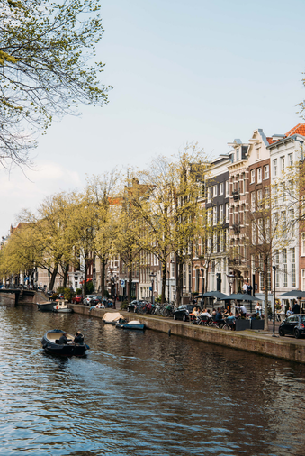 View of the ambassade hotel and its terrace from the canal.